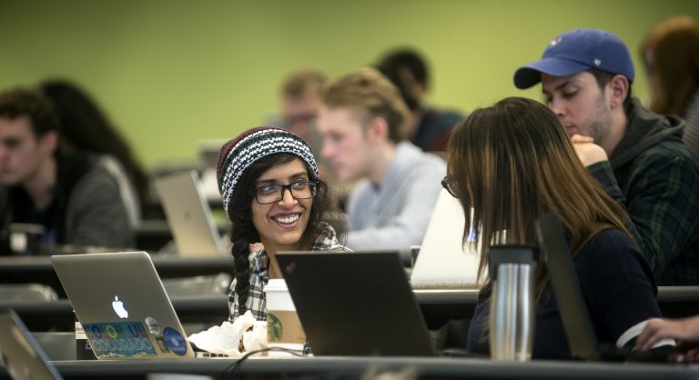 students with laptops